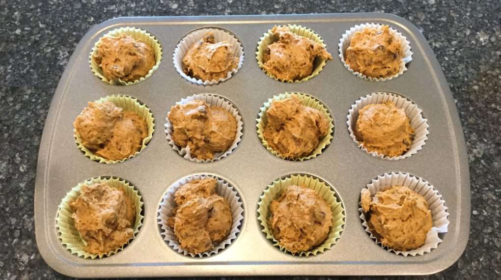 Scoop your batter into your muffin pan. You can make 12 larger muffins or 24 medium muffins. The batter is dense so it will not rise much.