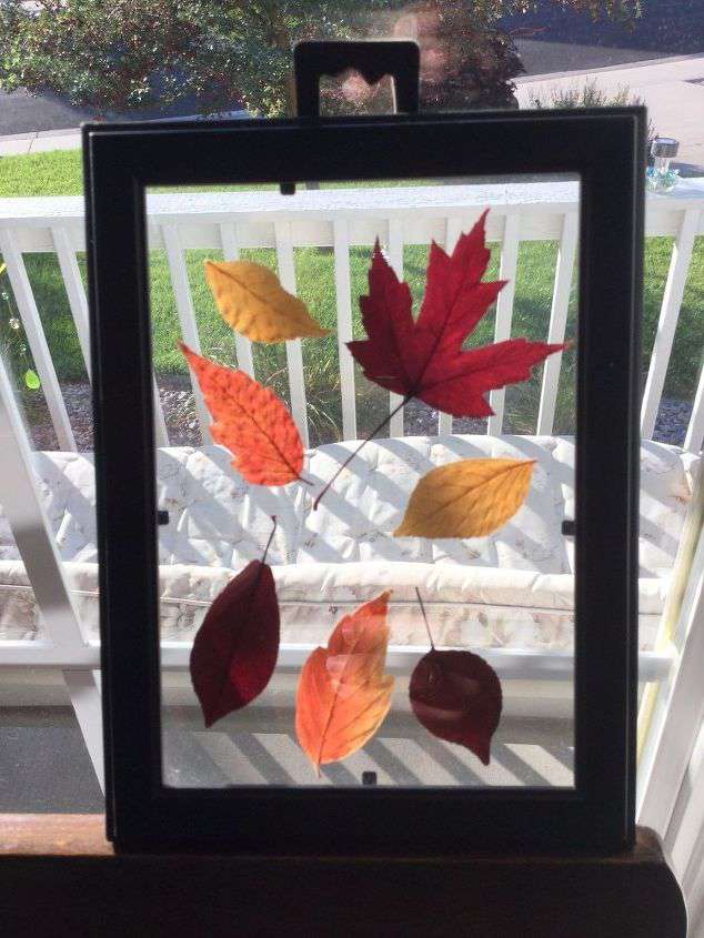 front of frame with fall leaves