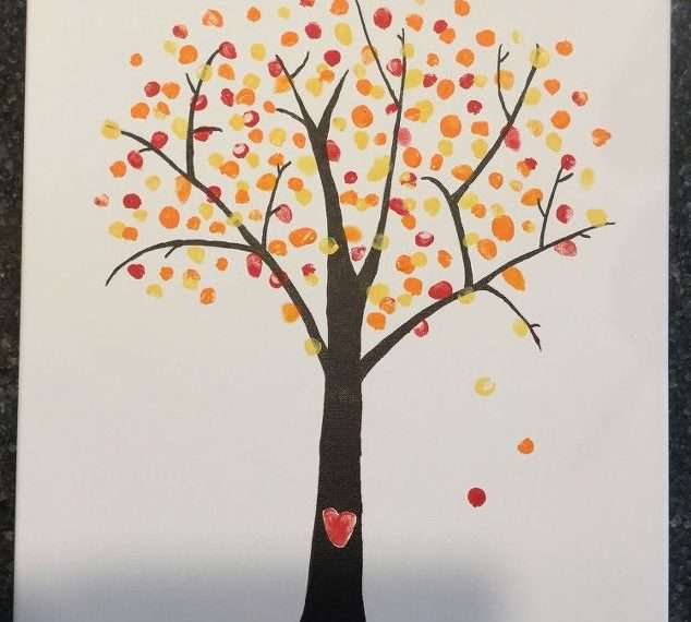 Once the back ground is dry you can begin painting your tree trunk and branches with the Chocolate paint. If you are intimidated by this, you could use a brown sharpie and color it on the canvas. Optional - I left a white heart shape in the tree trunk. Let this dry completely.