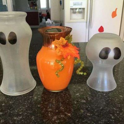 Do you have a bunch of vases on hand? Try these couple repurposed ideas - ghost & pumpkin vases