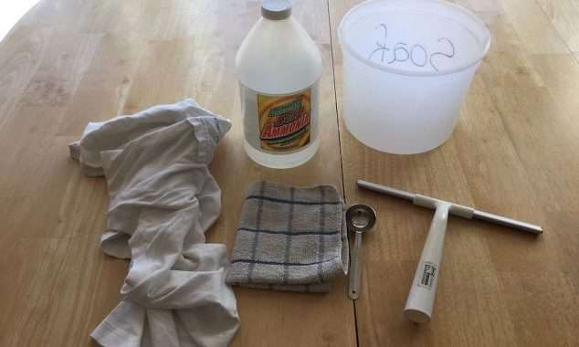 You'll need: A 1 gallon bucket Ammonia (mine came from Dollar Tree) 1 Table spoon Water Washcloth Old cotton-shirt Squeegee (mine came from IKEA)