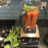 Place the tomatoes in a blender and add fresh basil leaves. Add as many or as few as you like. The more you add, the stronger the basil flavor.