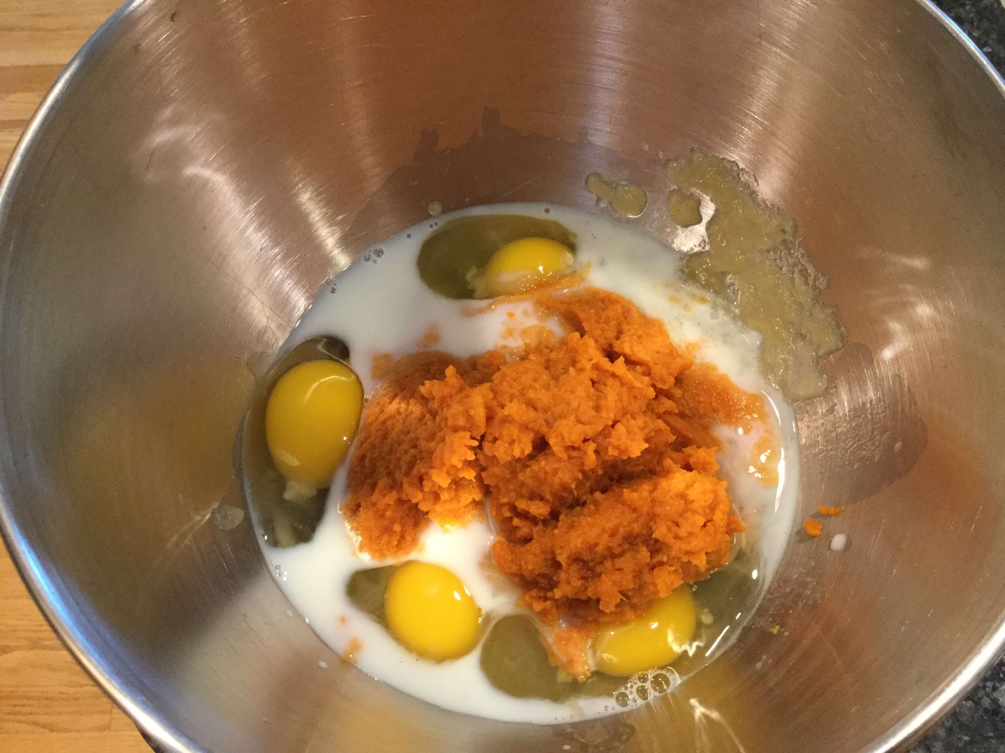 Put your eggs, milk, applesauce, and pumpkin in your mixer bowl (you are more than welcome to mix by hand).