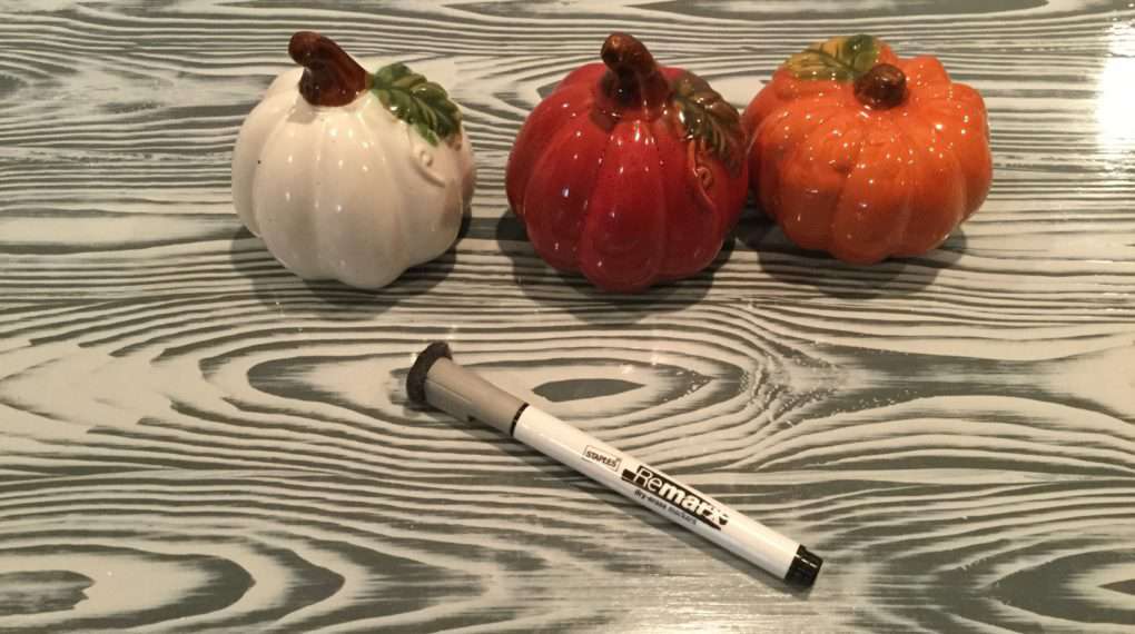 For this you'll need ceramic pumpkins - mine are from Dollar Tree - and a dry erase marker.