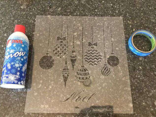 For this first way you'll need: A stencil - mine is from Cutting Edge Stencils Spray Snow - mine came from Walmart Painters Tape