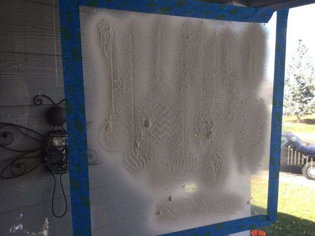Spray your window with the snow.