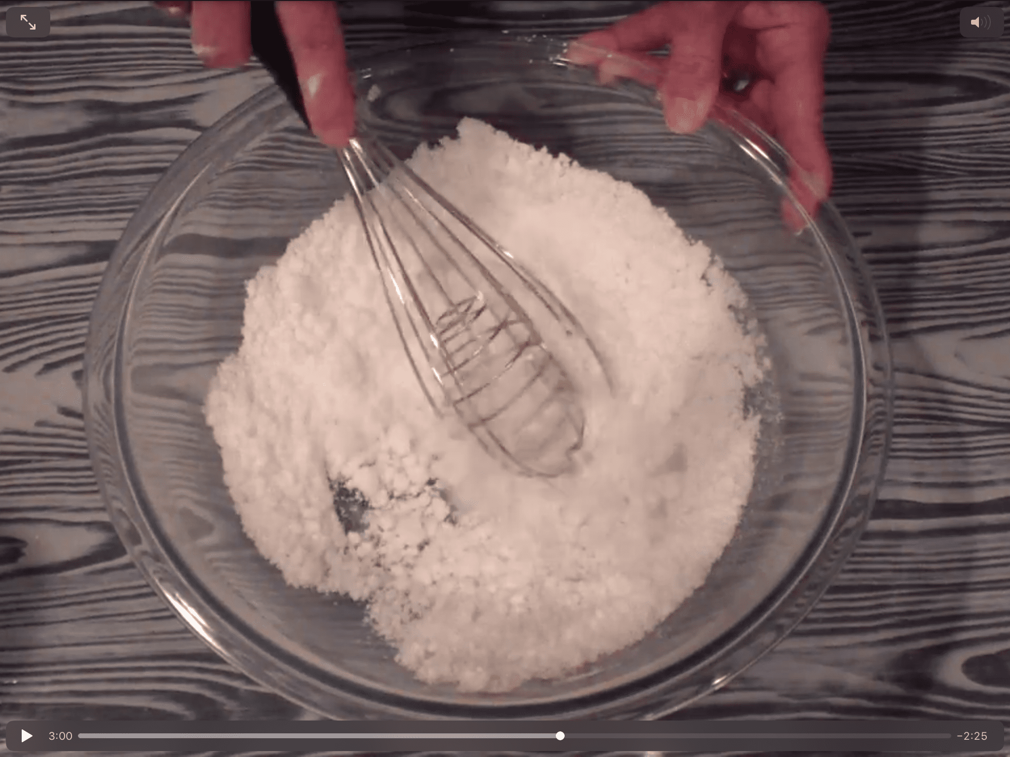using a whisk to mix bath bomb ingredients together