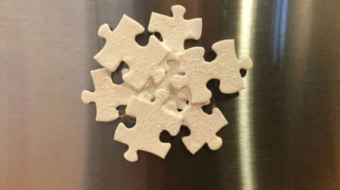 Beautiful Snowflake From Puzzle Pieces