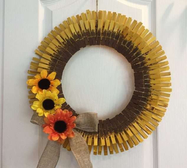 Tie a piece of twine at the top for hanging. Your sunflower wreath is done for you to enjoy.