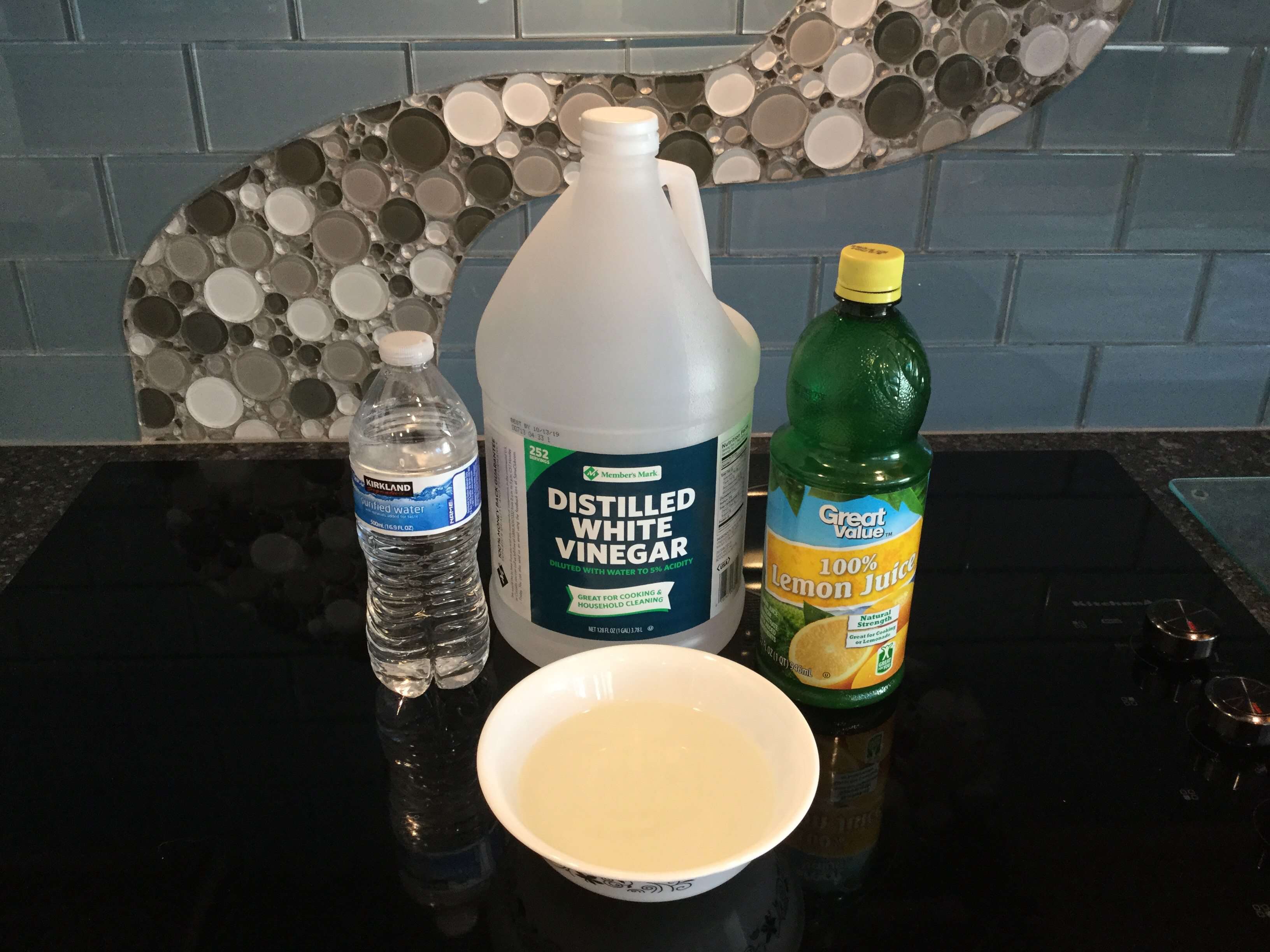 Pour 1 cup vinegar & 1 cup water in a bowl. Add 2 TBSP lemon juice. The acidity again is the cleaning agent in this mixture. Place the bowl in the microwave cook for approximately 7-10 minutes (depends on strength of microwave).