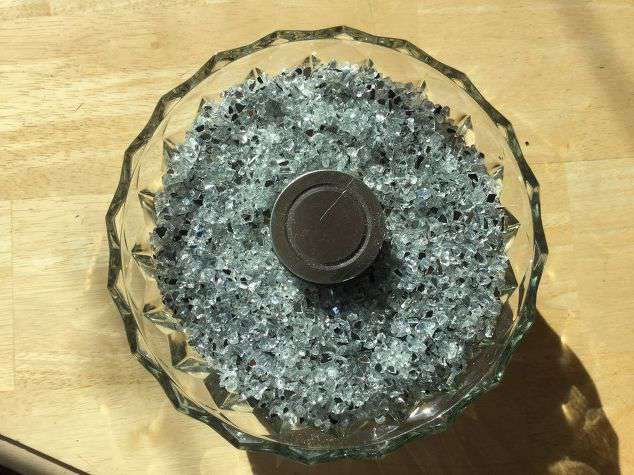 Put your decorative rock around the Sterno can. I left the lid on to make sure I didn't get any near the wick.