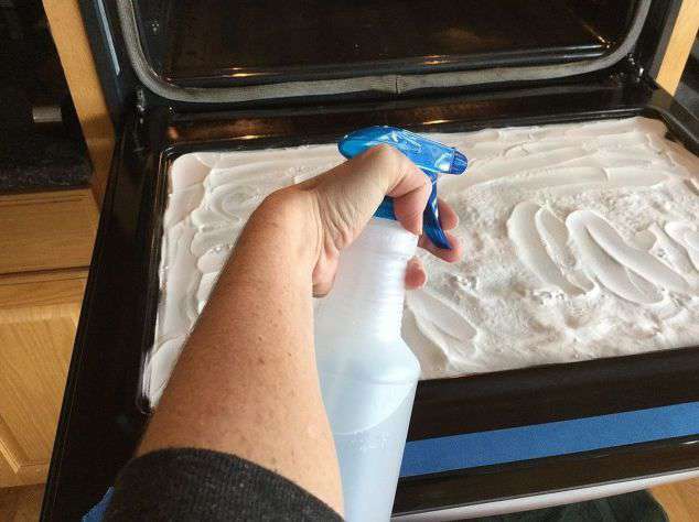Spray with a little water to dampen your baking soda (you want to make a paste)