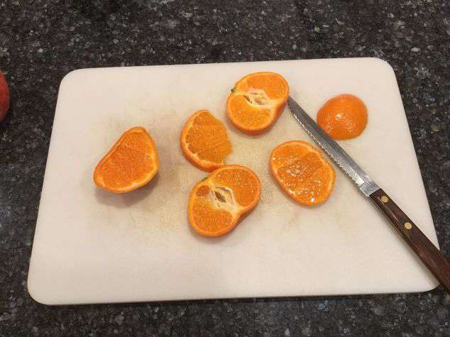 First slice up your oranges.