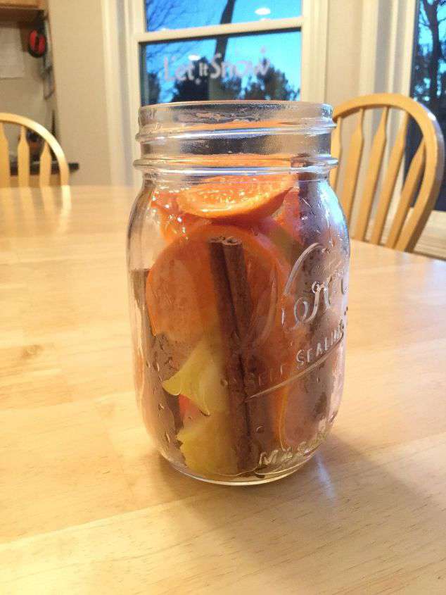 If you want to store it or give it as a gift. Put the fruit and cinnamon sticks in a jar.