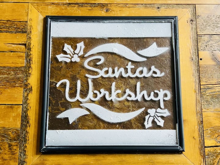 Step 7: Reveal the Completed Design As you lift the stencil, the Santa snow design will be revealed on the glass surface. Admire the festive pattern or shape that now adorns your window or mirror.