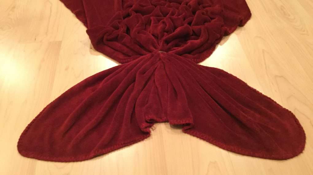 Here's roughly what it'll look like.  You can shape the blanket and the ponytail binder to get the shape you want.