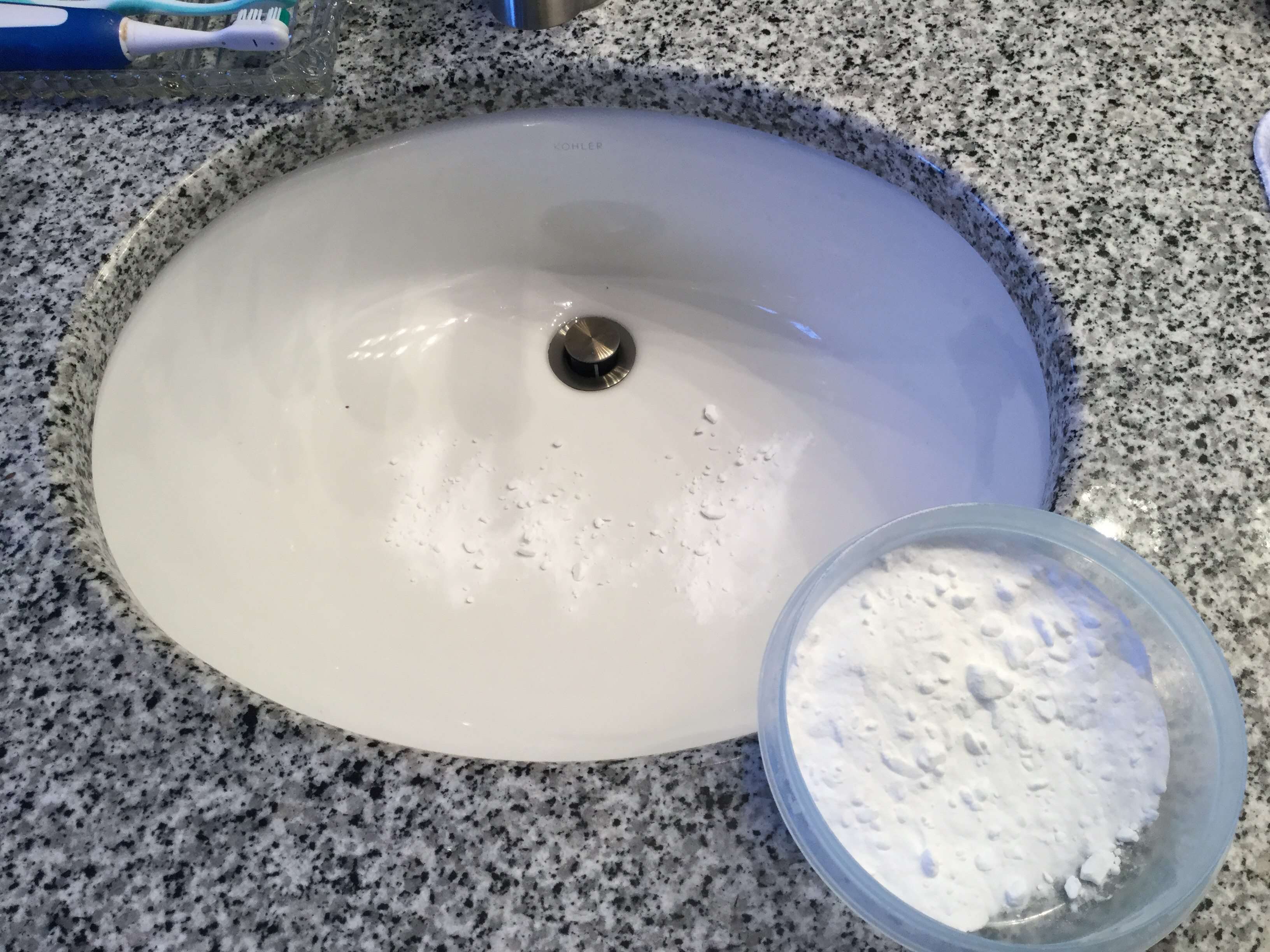 Sprinkle with baking soda, scrub it clean, and rinse.