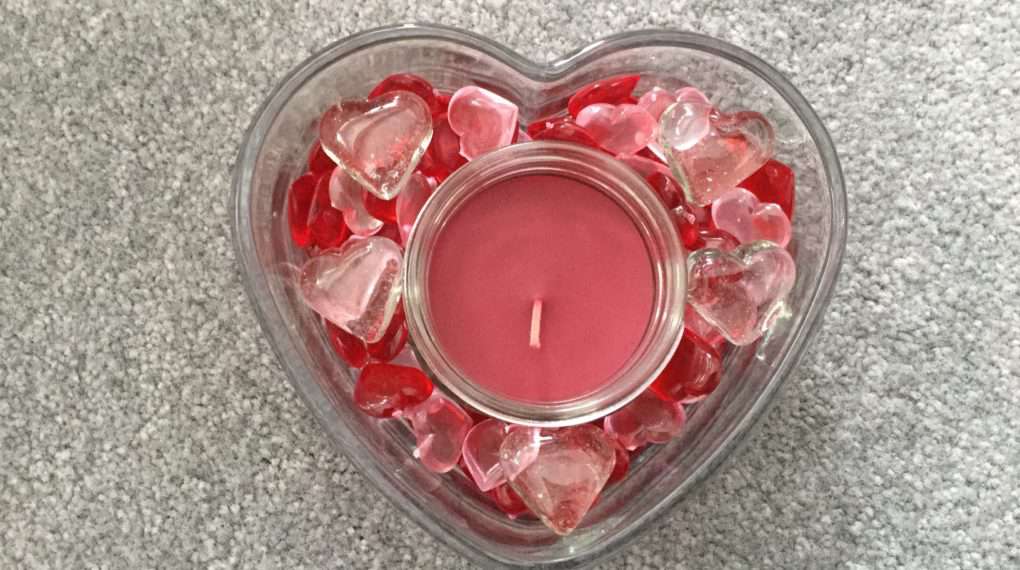 You can add a red lower profile mason jar style candle.