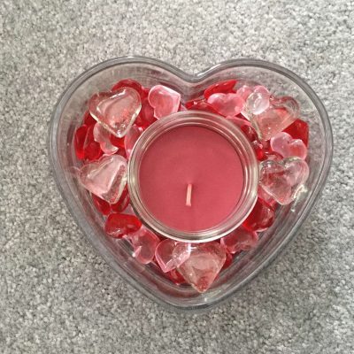 You can add a red lower profile mason jar style candle.