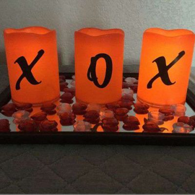 How do you make Valentine's Day decor ideas? This easy LED candle display is inexpensive and easy to make. Just a few candles, a few stickers, a tray with a little table scatter and your set! Great for your home, gift, or craft night party.