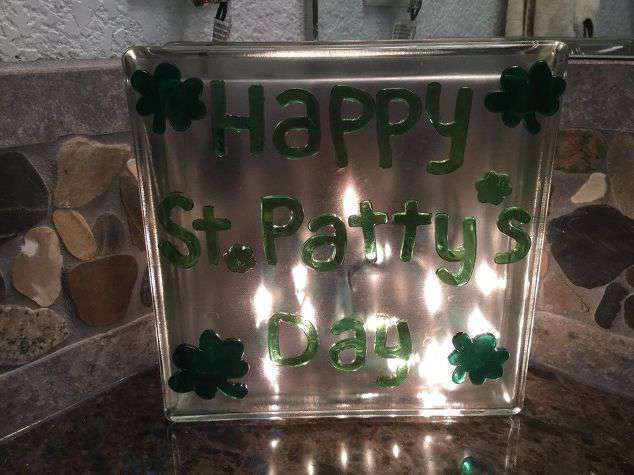 Option #2 you'll need: Glass Block - (mine came from Walmart, but you can find them online, craft stores, or hardware stores.) A strand of shamrock lights - (Dollar Tree) Contact Paper Wall Stickers (Dollar Tree)