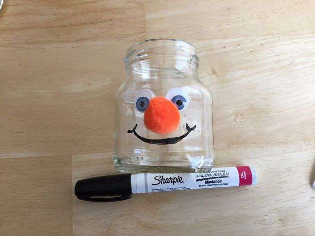 Using your permanent marker or paint pen, draw on a mouth.