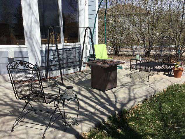 I noticed that this poor rocker on the bottom left corner didn't have a table space to put a beverage or snack. That is when I remembered I had the plant stand.