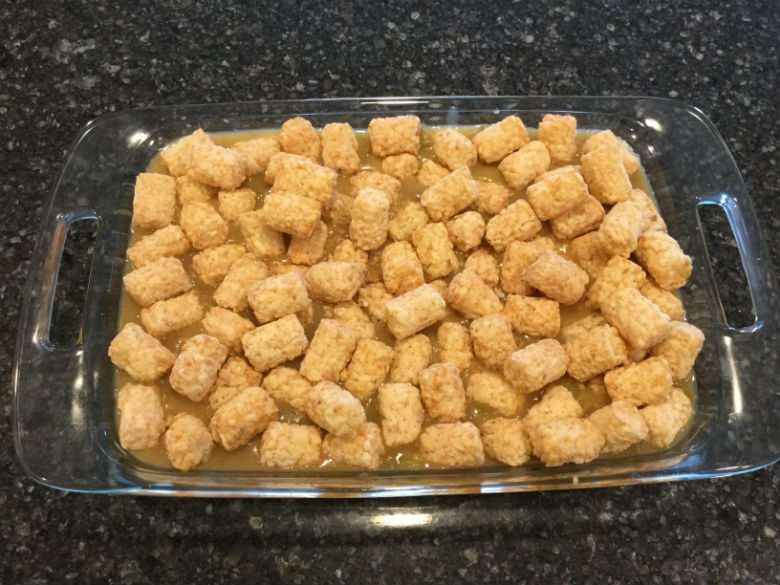 Add a 2 pound bag of frozen tater tots to the top.