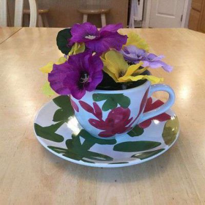 Plant some flowers in it. Great for a gift too!