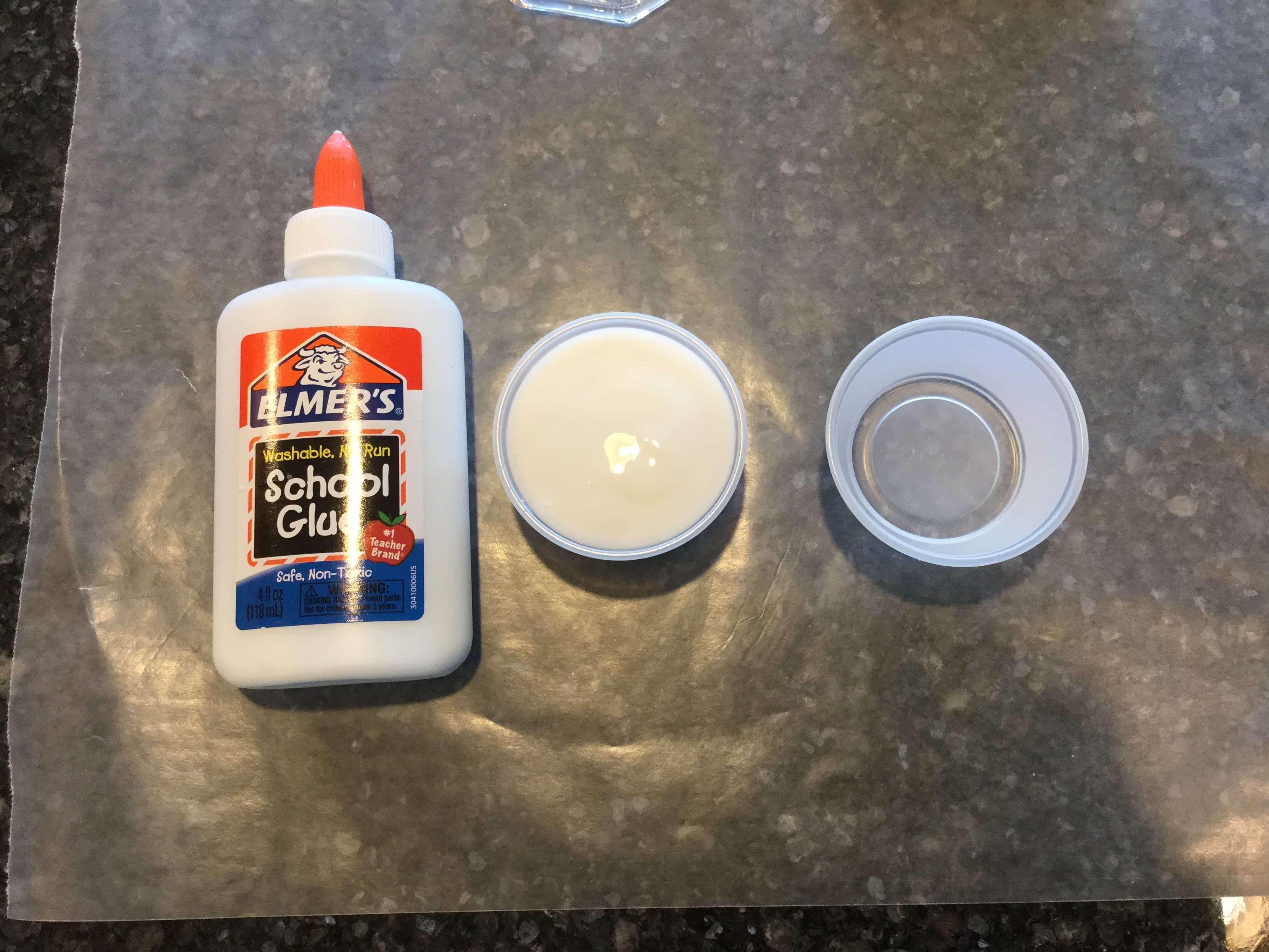 Pore white school glue into a small container