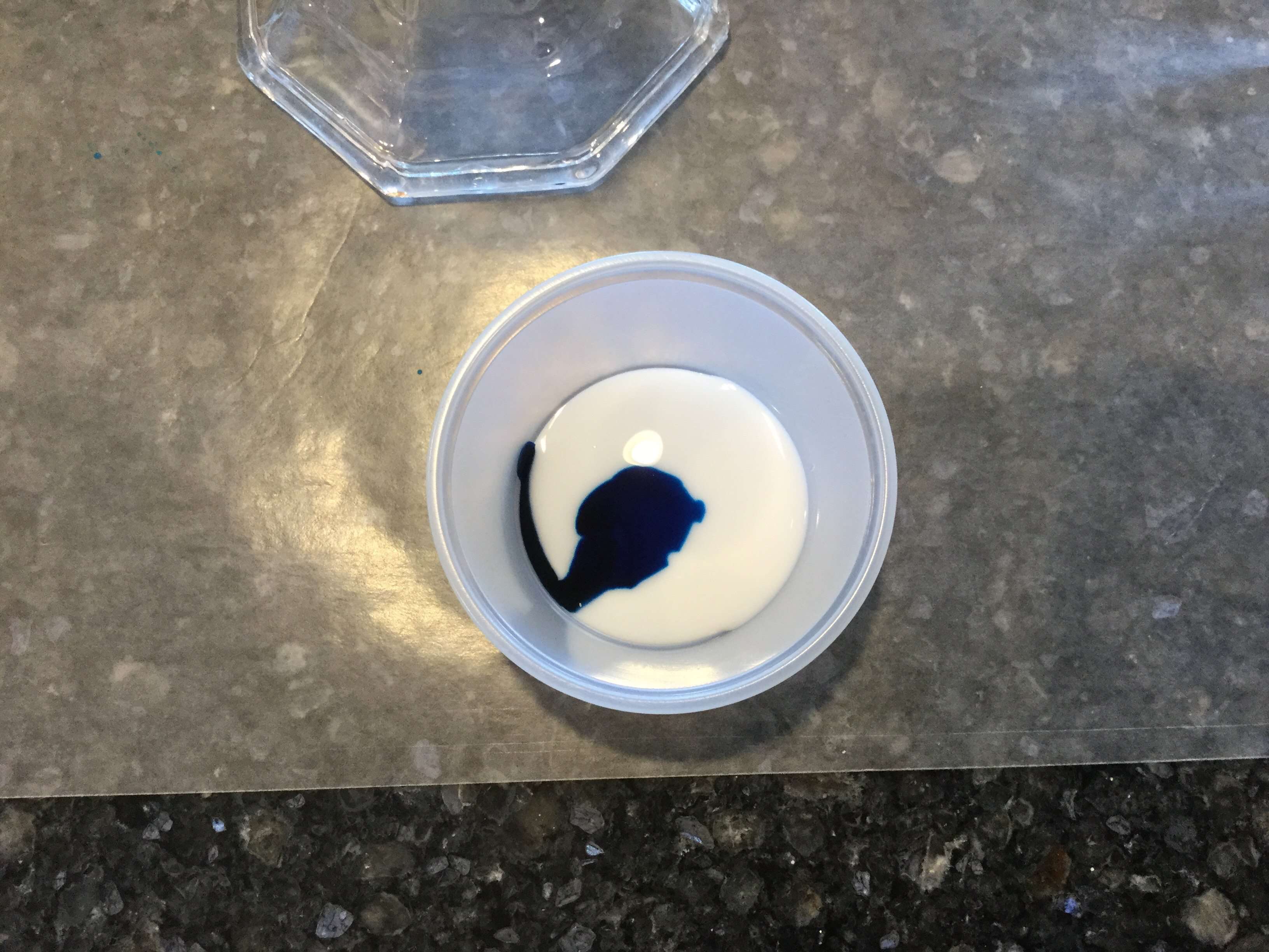 Put your glue in a container and add a few drops of food coloring - you can mix and match to get the color you like. A little goes a long way. For this project I only needed about 2 tablespoons of glue and 3-4 drops of food color.