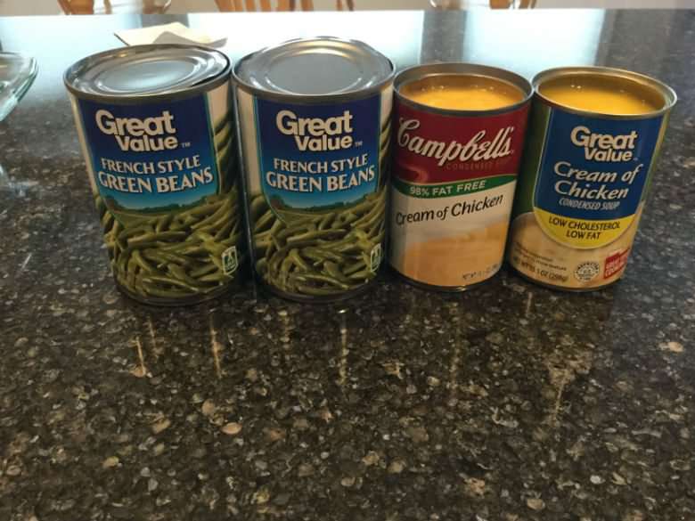 Stir in 2 cans of cream of chicken soup, and 2 cans of green beans (any style of your choice I used french cut this time) plus the water in the can with the green beans. Add seasonings to your liking - I just add a little salt and pepper.