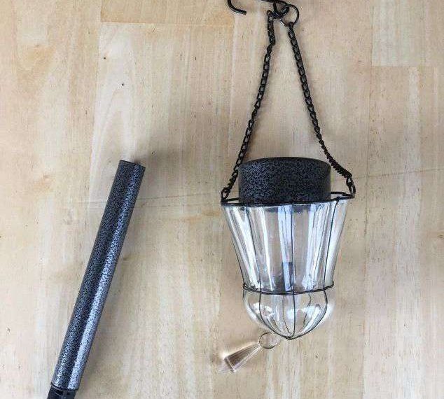 I found this hanging candle holder at a thrift store. Place your solar light in your candle holder.