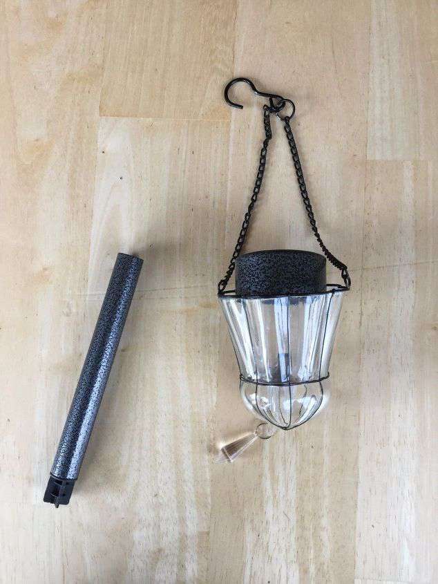 I found this hanging candle holder at a thrift store. Place your solar light in your candle holder.