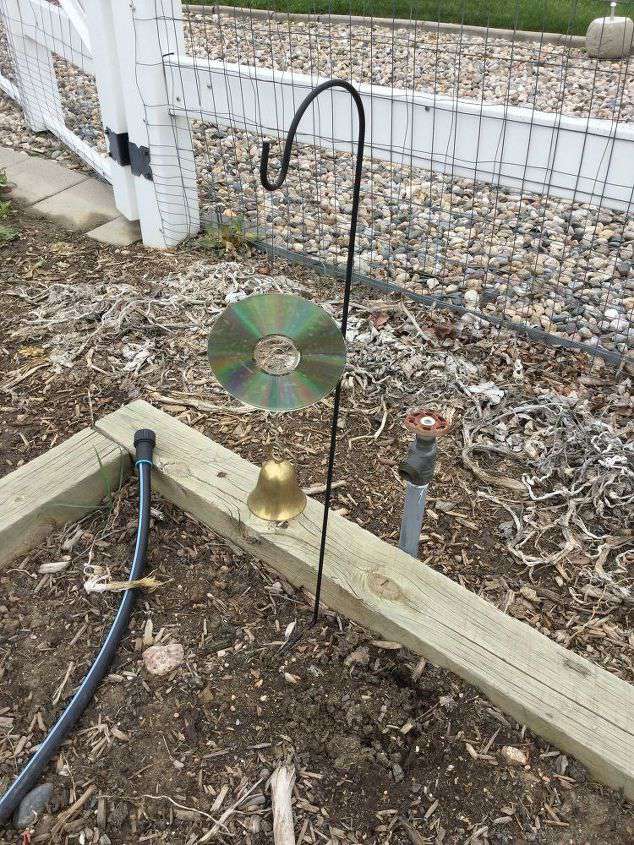 For my garden: I have 3 garden beds and I added 1 stake to each end of the middle bead (where my strawberries are and tomatoes go). I tied a loop of fishline to the cd and hung it on the stake. I made a second loop of line and added a bell.