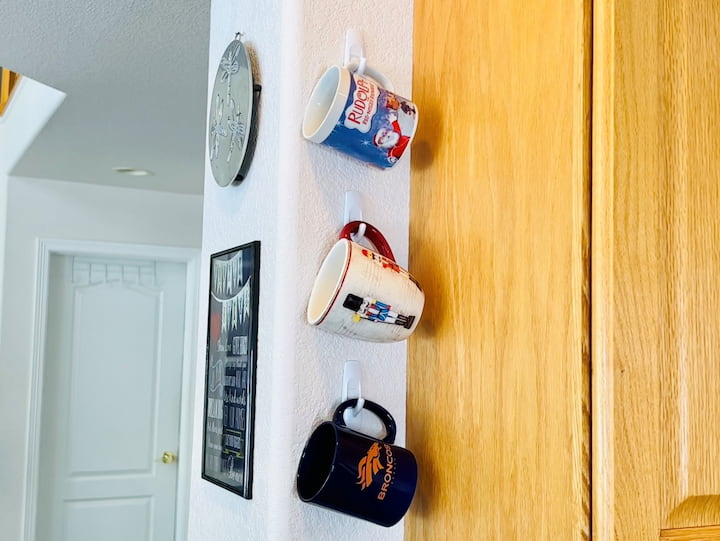 You can use these hooks to hang your mugs.  This frees up cabinet space and makes them easy to grab.