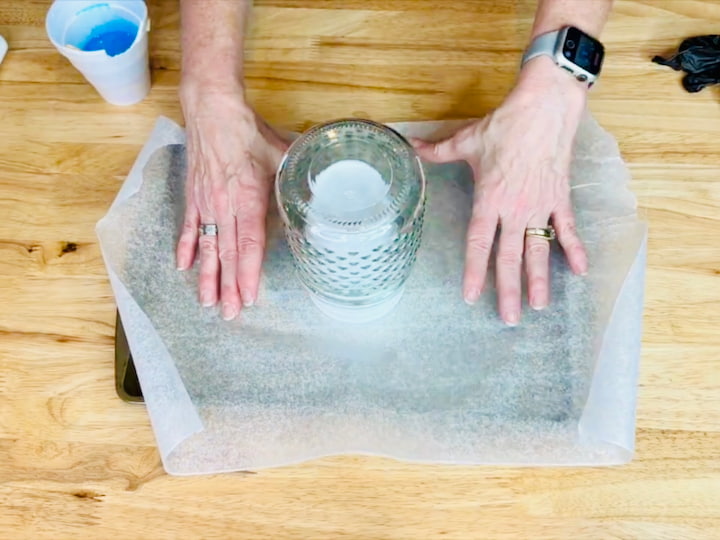 Placing glass jar upside down on a styrofoam cup