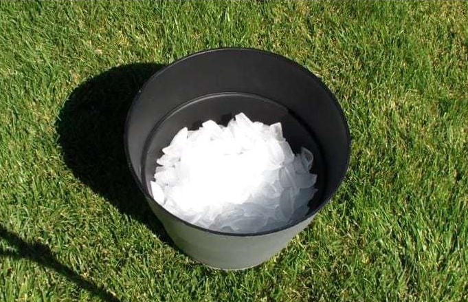 Here comes the fun part! Add some ice to the inside of your flower pot.