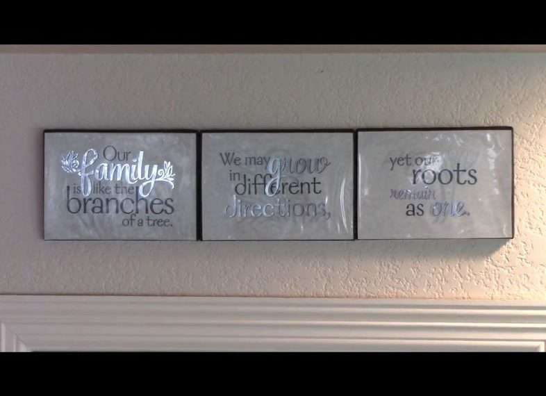 I used double stick tape on the back and I hung it up above our pantry in our kitchen.