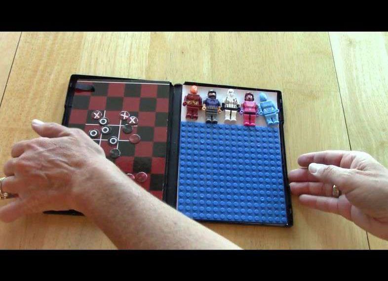 Place some Lego characters in the top section and close it up for transport. On the outside of the case I placed a white piece of paper and now it's a white board! Use dry erase markers to draw on the case and wipe off.