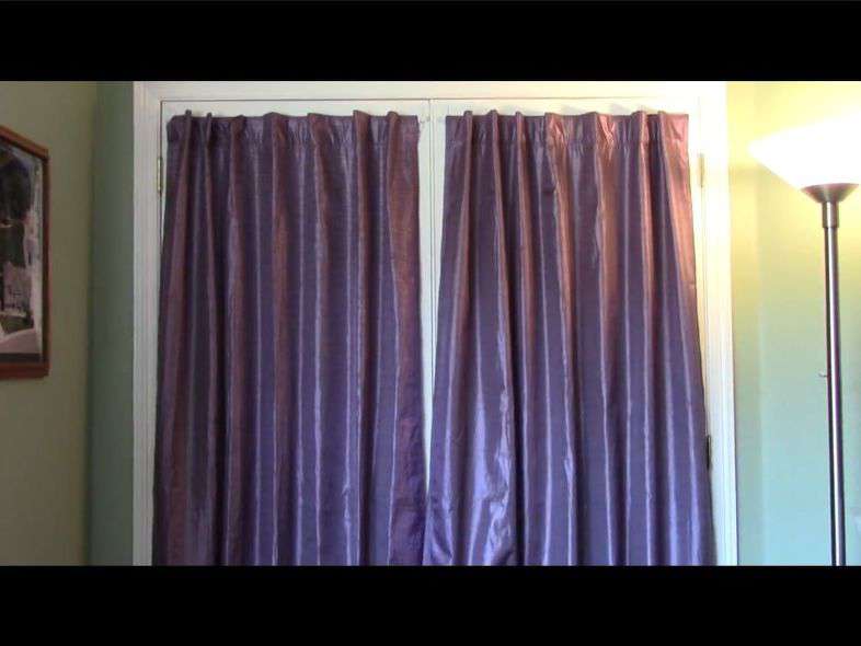 I placed the tension rods onto the hooks and we had curtains.
