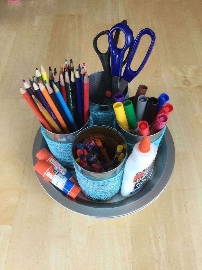 Place 4 cans inside your empty pie pan and fill with crafting supplies.