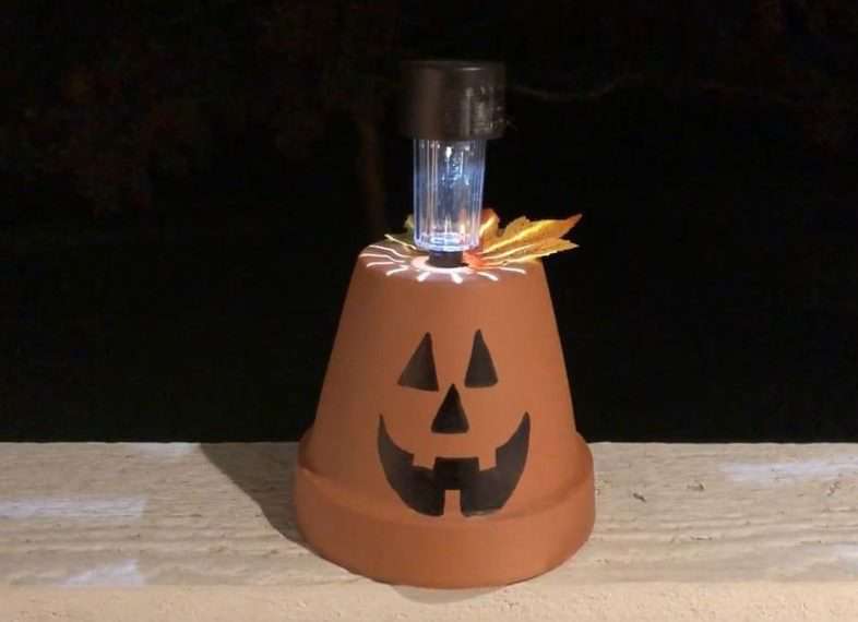 Terra Cotta Pumpkin Solar Lights - I use these to light up my walkway during Halloween. You can find the tutorial here - Flower Pot To Solar Pumpkin