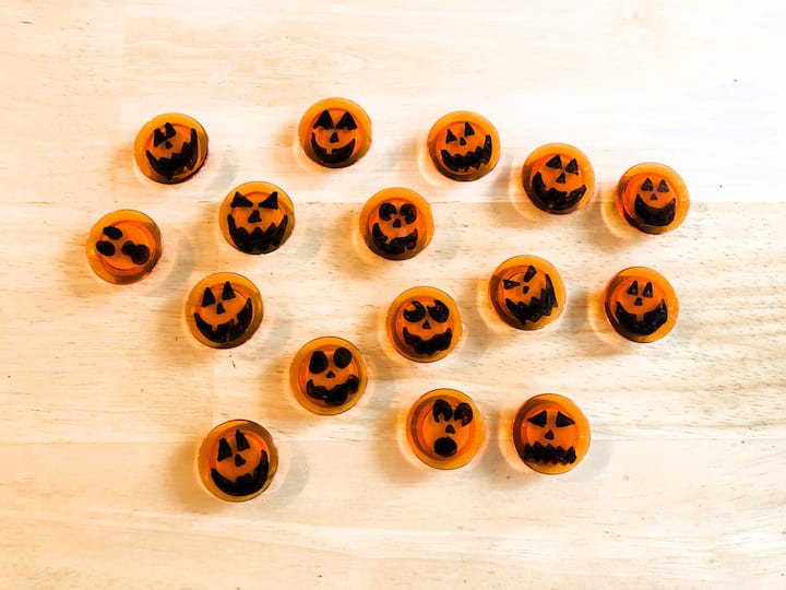 For this project, I grabbed some orange magents from the office section at the dollar store.  I drew a variety of pumpkin faces on the magnets.  This made a great party favor for me to hand out.  It also makes a great kids' project as well.