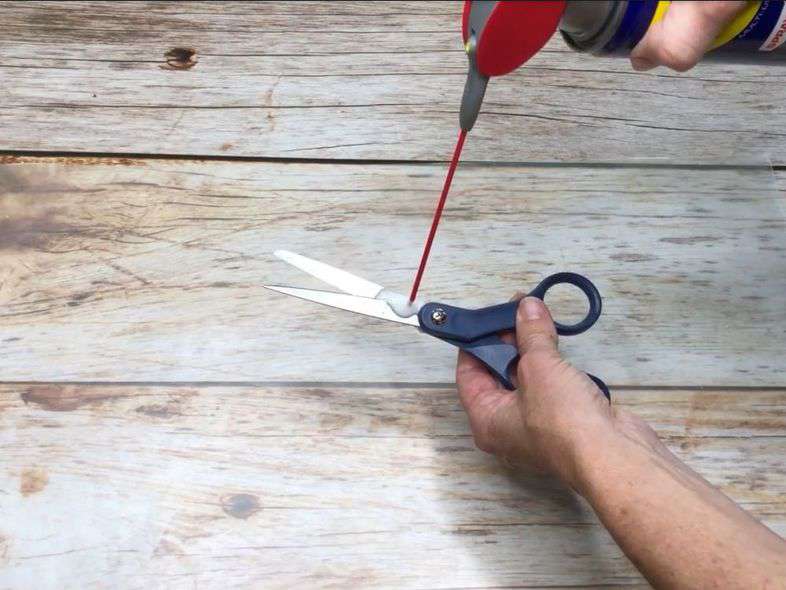 If your scissors get sticky residue in them and they are having a hard time opening and closing or sticking closed, spray a little on the scissors, wipe up the excess, and start wiggling them - they'll free right up. This works great on tools as well - pliers, garden shears, etc.