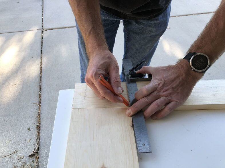 He took the bottom board and used it to measure a 1 x 4 to make the sides so they would be the same length.  The piece measured approximately 5.5 inches.