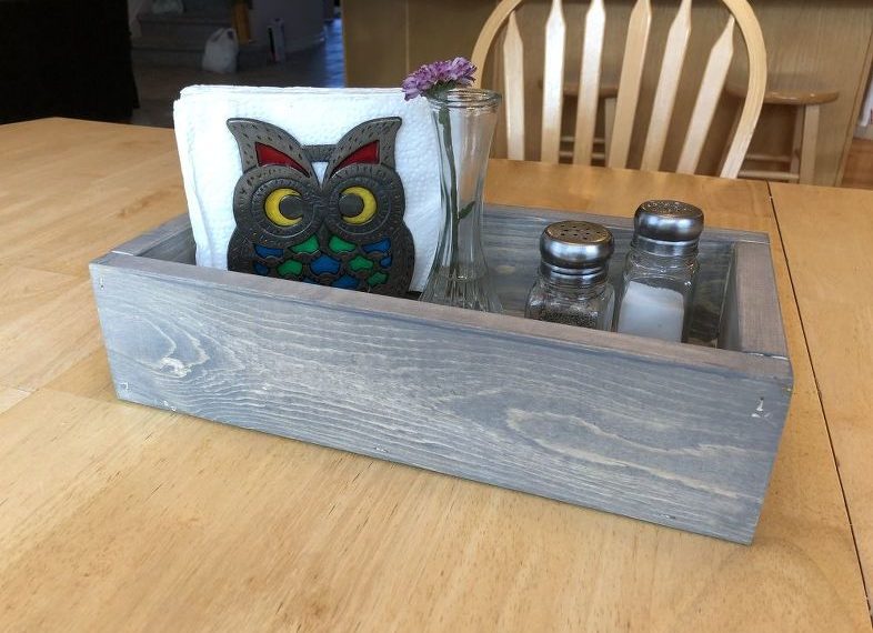 Here is where I'm using ours - on our kitchen table. I love that it keeps our salt and pepper shakers, and napkins in there and I can pick it up to easily wipe up the table.