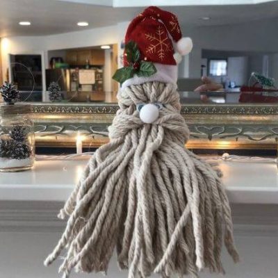 Do you want to know how to make a Santa out of a mop head? Mop head crafts are fun and inexpensive. Here's my tutorial on how to make a mop head Santa.