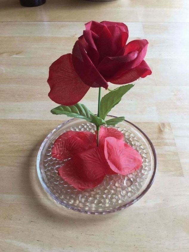 Use the rose petals to cover the glue holding the free-standing rose in place.