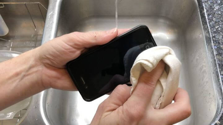 Use a damp cloth to clean the toothpaste off and your screen is clean.
